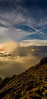 Stunning sunrise over a mountain landscape with dramatic clouds.