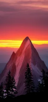 Vibrant mountain peak during sunset with colorful sky.