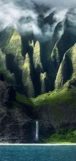 Majestic mountains with a waterfall and mist.