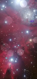 Vibrant cosmic nebula with stars in rich crimson hues creating a mesmerizing view.