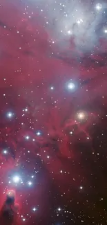 Crimson nebula with twinkling stars fills this celestial mobile wallpaper.