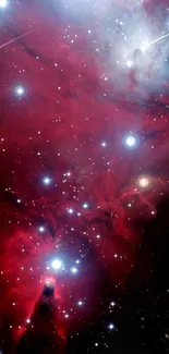 Crimson red nebula with glowing stars in a cosmic night sky.