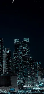 Night cityscape with illuminated skyscrapers under a starry sky and crescent moon.