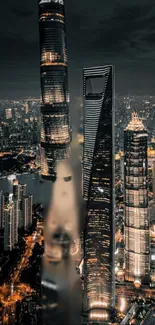 Night cityscape with illuminated skyscrapers and skyline view.