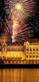 Fireworks over a historic building at night with reflections in the water.