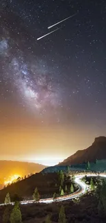 Night sky with Milky Way above a winding mountain road.