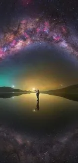 Person under Milky Way's night sky arc over calm lake.