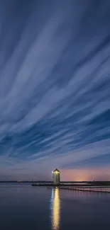 Night sky with serene reflections on water, perfect mobile wallpaper.