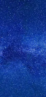 Deep blue night sky with stars and galaxy pattern.