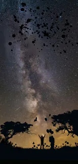 Stunning night sky wallpaper with galaxy and silhouette.