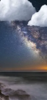 Starry night sky with galaxy and ocean view, enhanced with clouds.