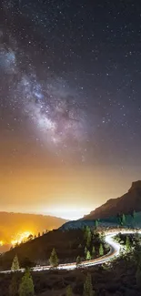 Mesmerizing night sky with Milky Way over scenic mountain landscape.