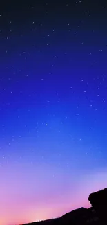 Serene night sky with stars and deep blue violet hues in a mobile wallpaper.