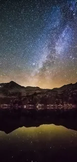 Beautiful night sky with Milky Way over mountain reflection.