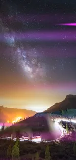 Breathtaking night sky with purple hues over mountains.