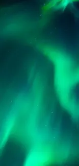 Vibrant green aurora borealis lighting up the dark night sky.