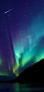 Vibrant aurora borealis with starry night sky over mountains.