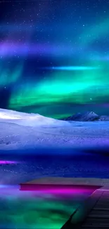 Vivid Northern Lights wallpaper with snowy landscape and starry sky.