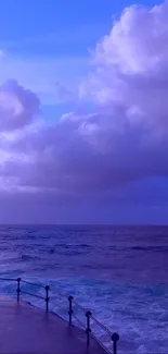 Ocean dusk wallpaper with purple hues and calming atmosphere.