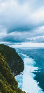 Vibrant ocean cliffs with blue seas beneath a cloudy sky.