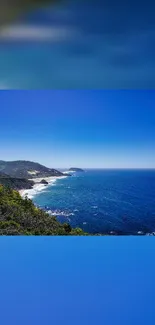 Vibrant ocean horizon with lush green hills under a clear blue sky.