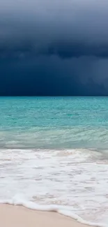 Stormy ocean landscape with dark clouds and turquoise waters.