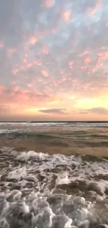 Beautiful ocean sunset with calm waves and colorful sky.