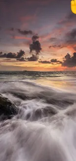 Sunset over ocean with clouds and waves in a tranquil seascape scene.