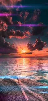 Stunning ocean sunset with vibrant teal sky and tranquil waves.