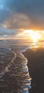 Golden sunset over ocean waves with dramatic clouds.