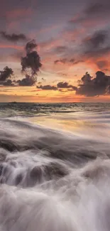 Breathtaking ocean sunset with vibrant sky and flowing waves, perfect for mobile.