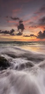 Crashing ocean waves at sunset with dramatic skies.