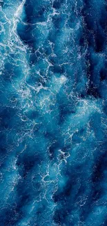 Beautiful ocean waves in vibrant blue hues, perfect for calming mobile wallpaper.