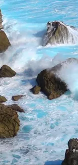 Dynamic ocean waves crash against rocky cliffs with vibrant blue tones.