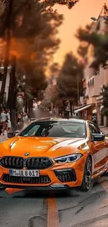 Orange sports car in scenic urban street view, perfect for mobile wallpaper.