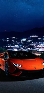 Orange sports car at night with city backdrop.