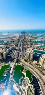 Aerial view of Palm Jumeirah, Dubai, with blue sea and modern architecture.