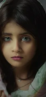 Portrait wallpaper of a young girl with blue eyes.