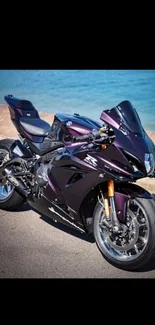 Sleek purple sports bike parked by the water.