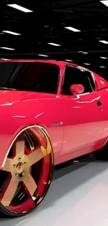 Sleek red car displayed in a modern showroom.