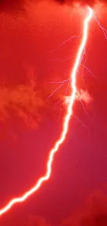 Dramatic red lightning storm with striking bolt.