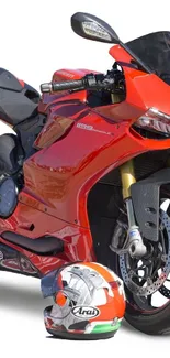 Dynamic red motorcycle with helmet on white background.