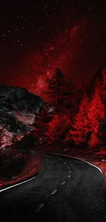 Red forest road under starry sky at night wallpaper.