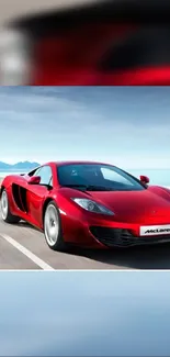 Red sports car on open road with blue sky background.