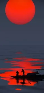 Red sun reflecting on calm waters at sunset.