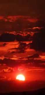 Fiery red sunset with dramatic clouds.