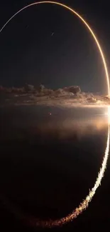 Night sky with a radiant rocket trail reflecting in water.