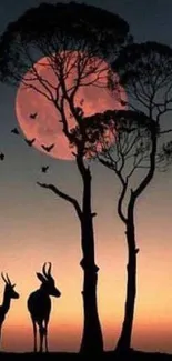 Silhouettes against a red moon in nature, creating a serene night scene.