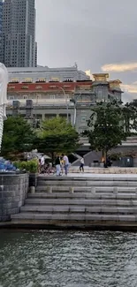 Singapore skyline with Merlion statue fountain and city buildings.