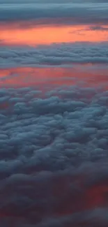 Vibrant sunset sky with orange clouds.